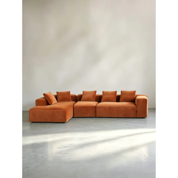 Understated Statement Sectional in Caramel Orange Velvet — in a room setting