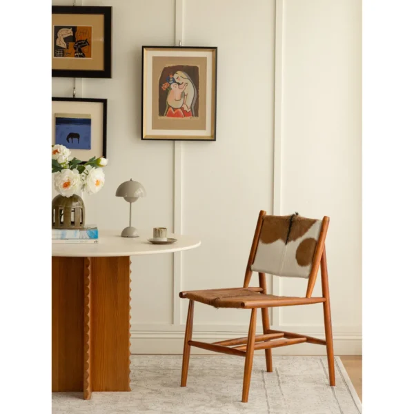 Goat Hide Teak Chair with Woven Seat, 62 cm in clay — in a room setting