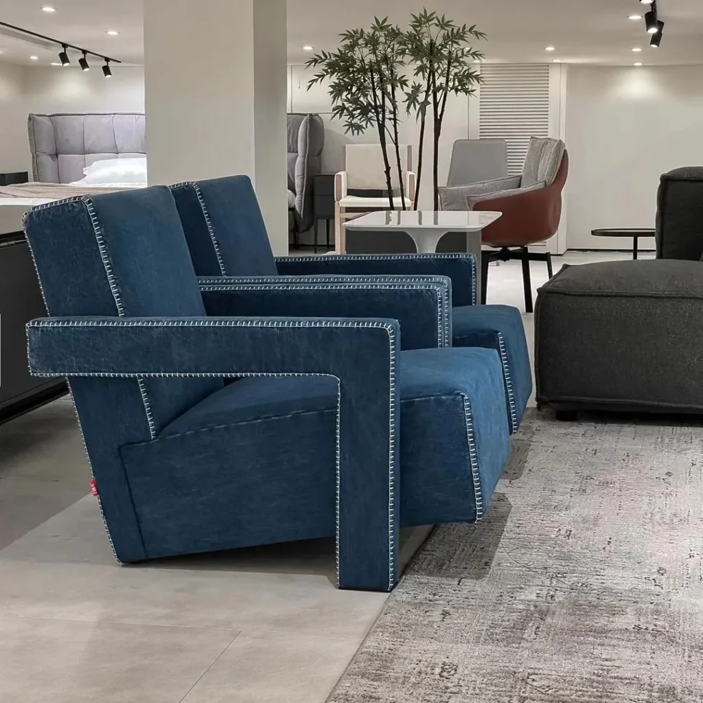 Selvedge Denim Armchair with Wraparound Arms in blue — front view
