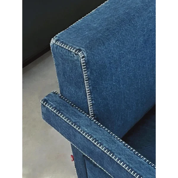Selvedge Denim Armchair with Wraparound Arms in blue — in a room setting