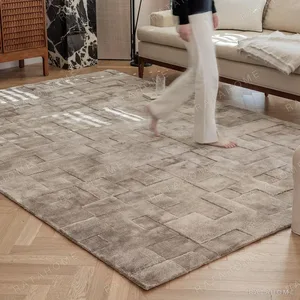 Versatile Plain Taupe Rug with Soft Sheen in sand — in a room setting