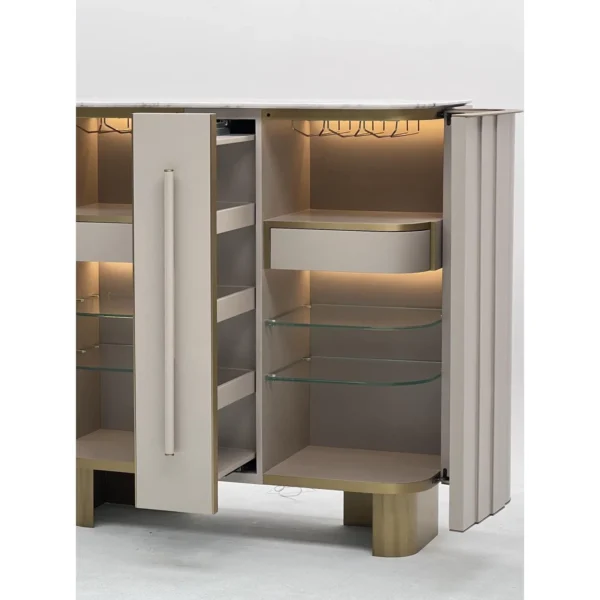 Curved Ribbed Bar Sideboard with Marble Top and Brass Feet in oatmeal — in a room setting