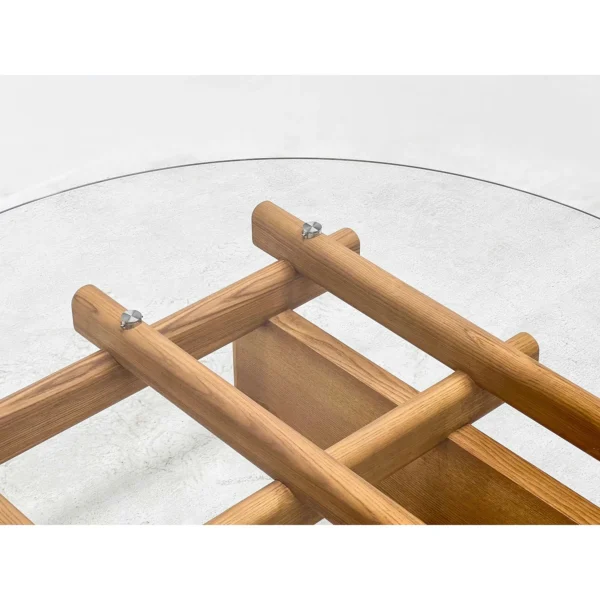 Round Tempered Glass Coffee Table on Joinery Wood Lattice in natural oak — in a room setting