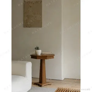 Vintage Solid Wood Pedestal Side Table Trio in walnut — in a room setting