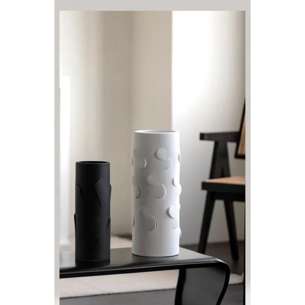White Cylinder Ceramic Vase in ivory — in a room setting