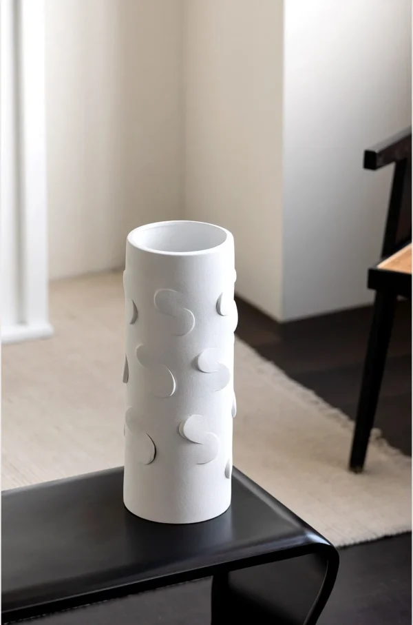 White Cylinder Ceramic Vase in ivory — in a room setting