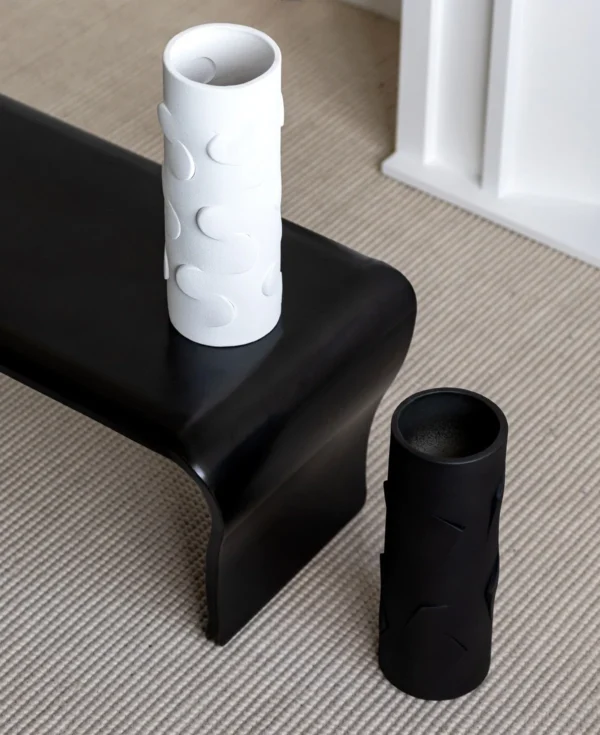 White Cylinder Ceramic Vase in ivory — in a room setting