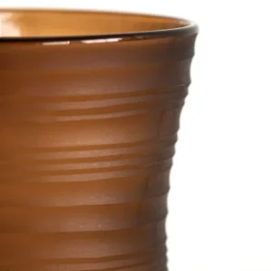 Brown Ribbed Frosted Glass Vase on Dark Foot, Short or Tall in clay — in a room setting