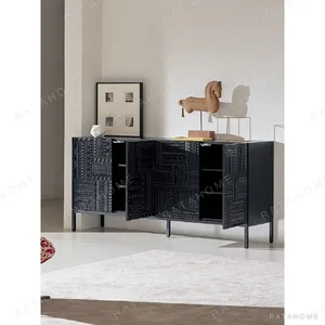Carved Geometric Sideboard in Black on Steel Base — in a room setting