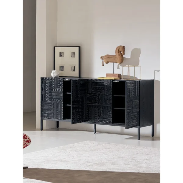 Carved Geometric Sideboard in Black on Steel Base — in a room setting