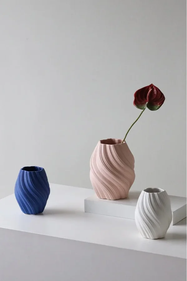 Matte Twisted Rib Ceramic Vase, Three Sizes in sand — in a room setting