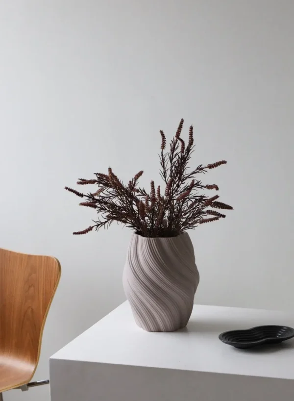 Matte Twisted Rib Ceramic Vase, Three Sizes in sand — in a room setting