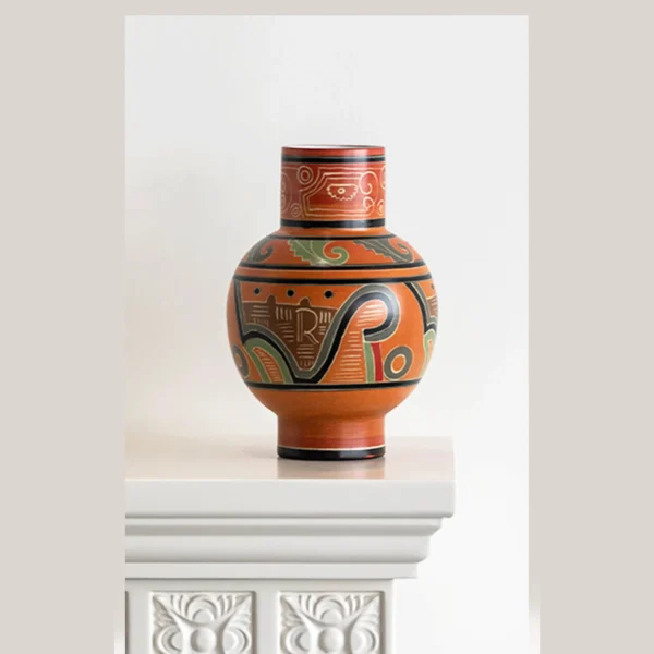 Hand-Painted Totem Ceramic Vase in Terracotta and Green — in a room setting