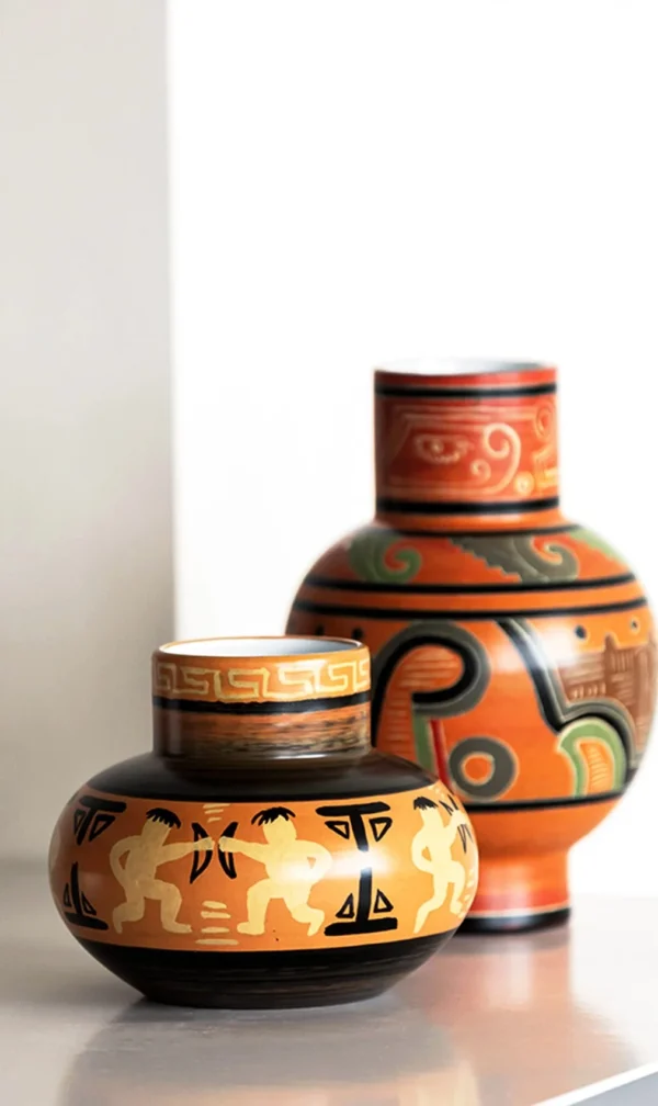Hand-Painted Totem Ceramic Vase in Terracotta and Green — in a room setting