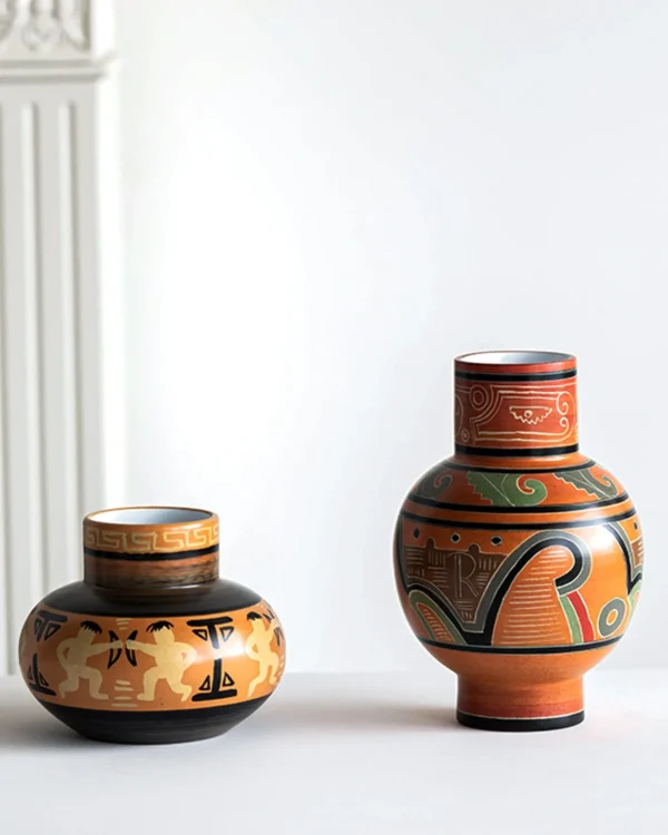 Hand-Painted Totem Ceramic Vase in Terracotta and Green — in a room setting