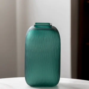 Dark Green Ribbed Frosted Glass Vase, Three Designs in olive — in a room setting