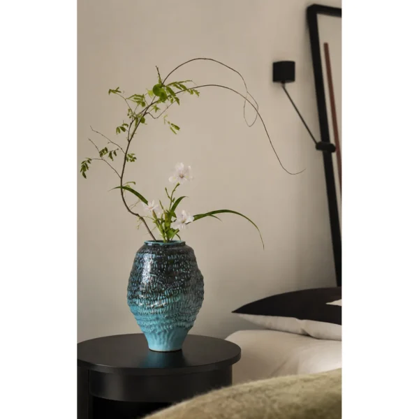 Deep Sea Blue Gradient Pleated Ceramic Vase in blue — in a room setting