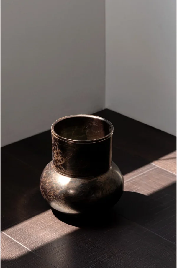 Distressed Bronze-Effect Ceramic Zun Vase in bronze — in a room setting