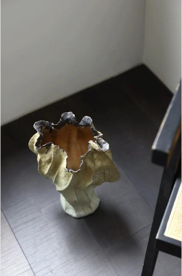 Distressed Pleated Ceramic Vase in Antiqued Olive — in a room setting