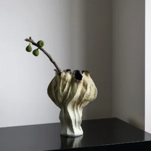 Distressed Pleated Ceramic Vase in Antiqued Olive — in a room setting