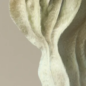 Distressed Pleated Ceramic Vase in Antiqued Olive — in a room setting
