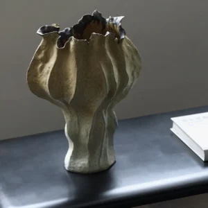Distressed Pleated Ceramic Vase in Antiqued Olive — in a room setting