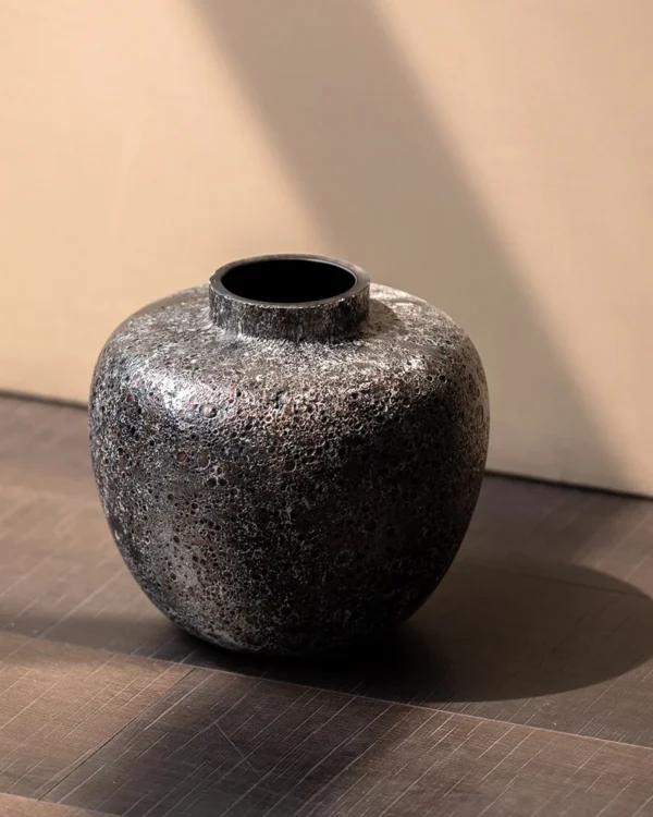 Dust Texture Round-Belly Glass Vase in Bronze, Short or Tall — in a room setting