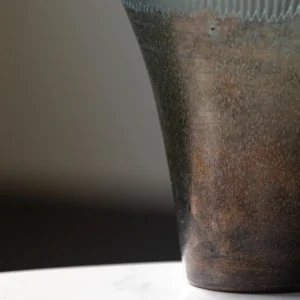 Ribbed Smoked Glass Flared Vases, Tall or Short in slate — in a room setting