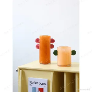 Playful Coloured Glass Vases in olive — in a room setting