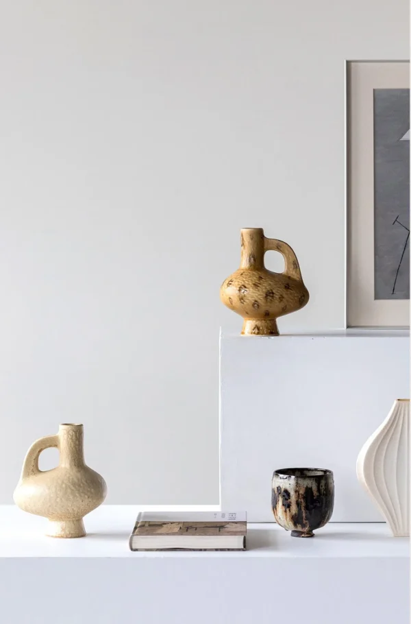 Hand-Made Handled Ewer Vase in Sand Ochre, Two Forms — in a room setting