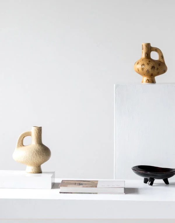 Hand-Made Handled Ewer Vase in Sand Ochre, Two Forms — in a room setting
