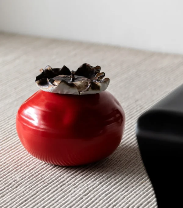 Cinnabar Red Kiln-Change Round Jar with Lotus-Edge Rim in red — in a room setting