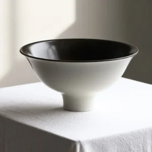 Hand-Made Footed Dessert Bowl in Cream and Black Glaze — front view