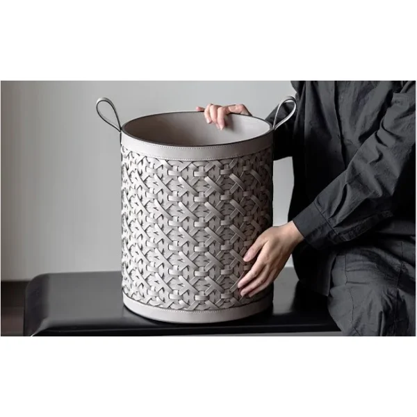 Vintage Hand-Woven Leather Laundry Hamper in Taupe — in a room setting