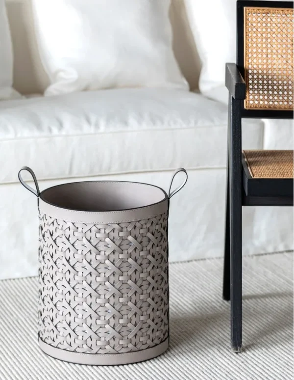 Vintage Hand-Woven Leather Laundry Hamper in Taupe — in a room setting