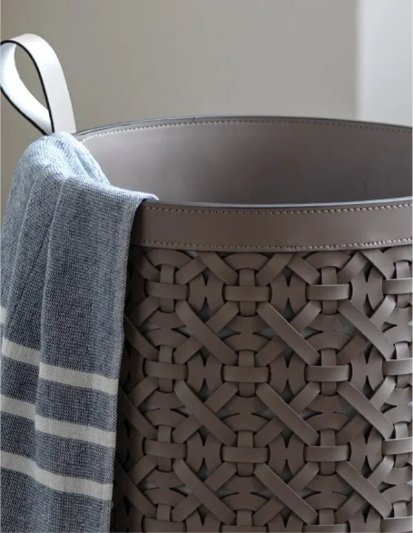 Vintage Hand-Woven Leather Laundry Hamper in Taupe — in a room setting