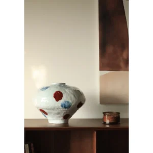 Jingdezhen Glossy White Vase in ivory — in a room setting