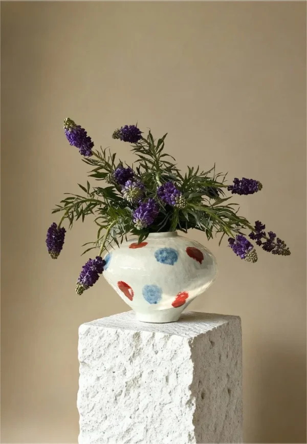 Jingdezhen Glossy White Vase in ivory — in a room setting