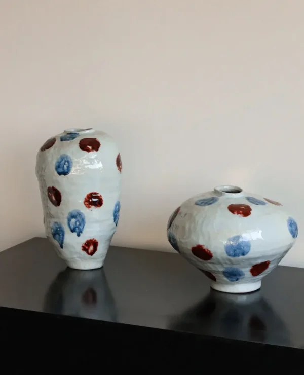 Jingdezhen Glossy White Vase in ivory — in a room setting