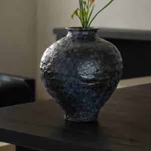 Kiln-Change Mottled Blue-Black Round Jar Vase, Small in black — front view