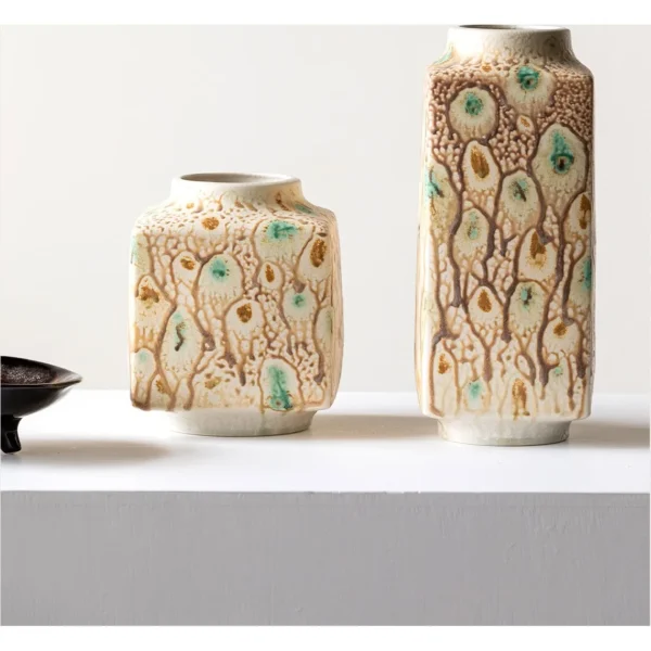 Kiln-Change Speckled Ceramic Vases in sand — in a room setting