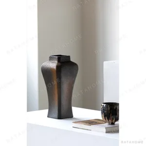Kiln-Change Black Square Ceramic Vase with Waisted Shoulder in black — in a room setting