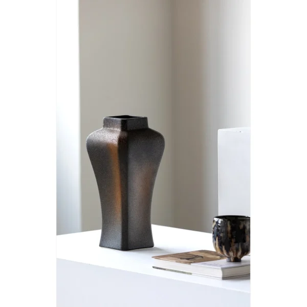 Kiln-Change Black Square Ceramic Vase with Waisted Shoulder in black — in a room setting