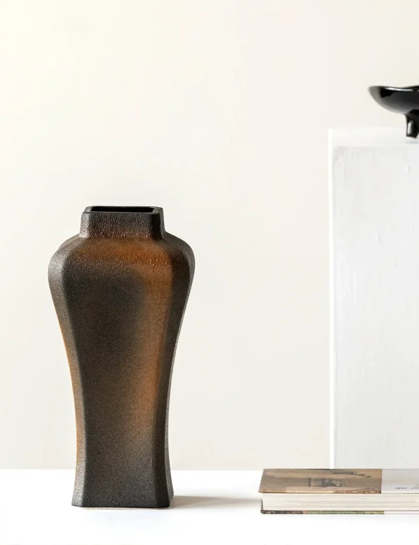 Kiln-Change Black Square Ceramic Vase with Waisted Shoulder in black — in a room setting