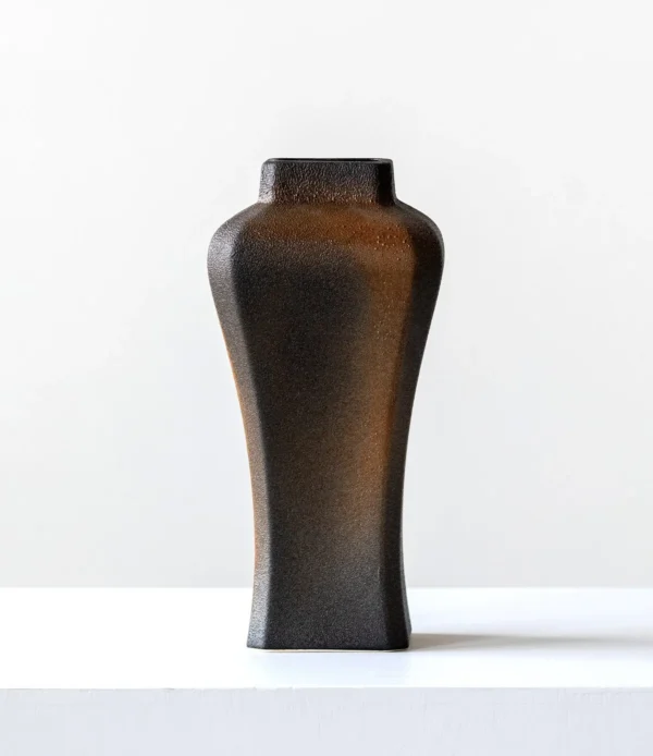 Kiln-Change Black Square Ceramic Vase with Waisted Shoulder in black — in a room setting