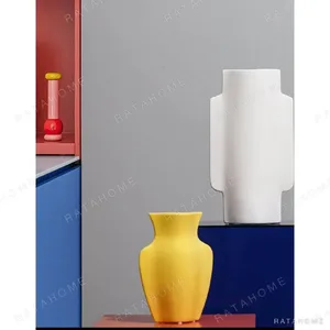 Glossy Mid-Century Urn Vases in Red, Yellow and Blue — in a room setting