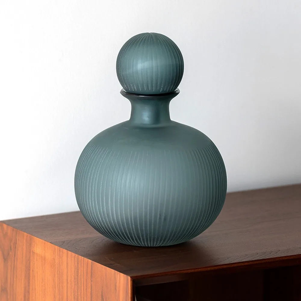 Mist Blue Ribbed Frosted Glass Bottle Vase with Ball Stopper in blue — front view