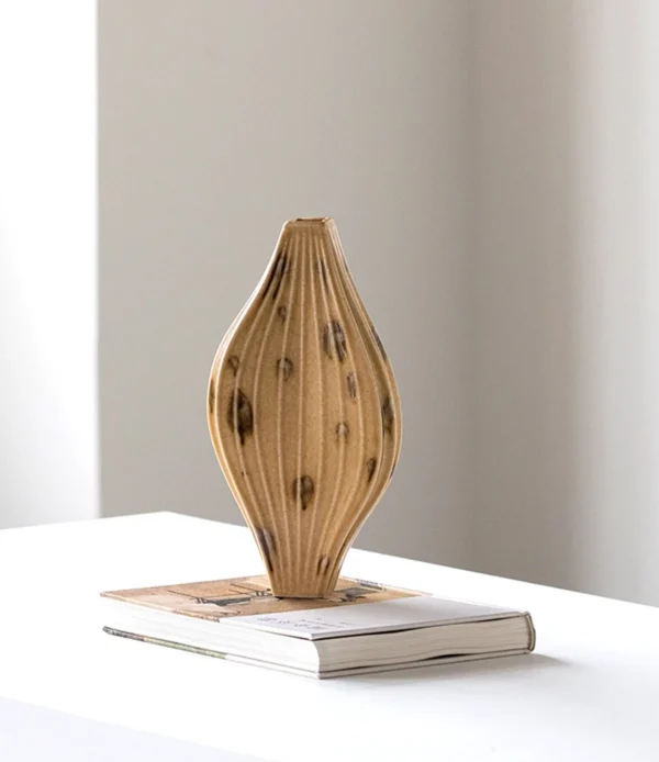 Ochre Ribbed Diamond Ceramic Vase on Flared Foot, Two Forms in mustard — in a room setting