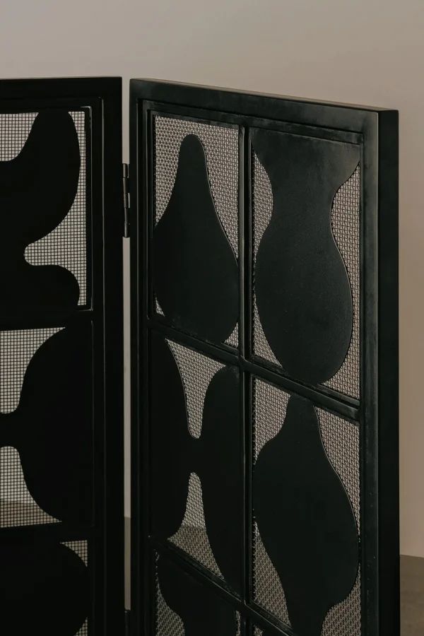 Vessel-Silhouette Openwork Folding Screen in black — in a room setting