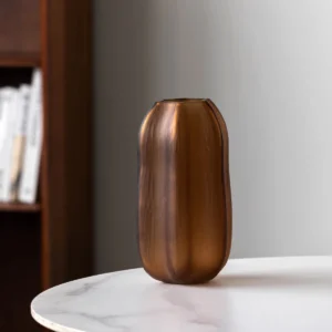 Ribbed Frosted Amber Pumpkin Glass Vase, Short or Tall in clay — in a room setting